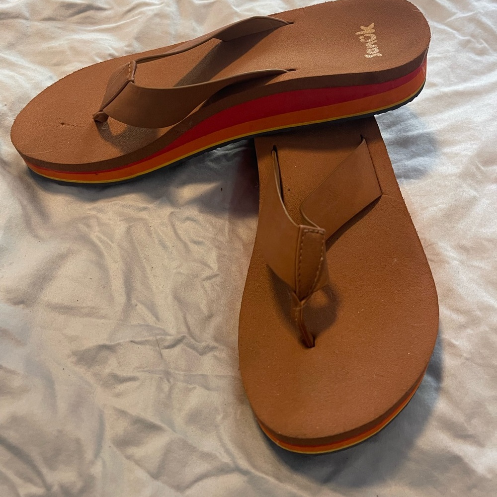 Sanuk Women's Brown Sandals with Red and Orange Accents
